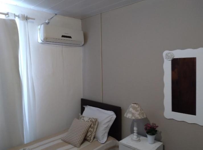 Em Casa Compartilhada